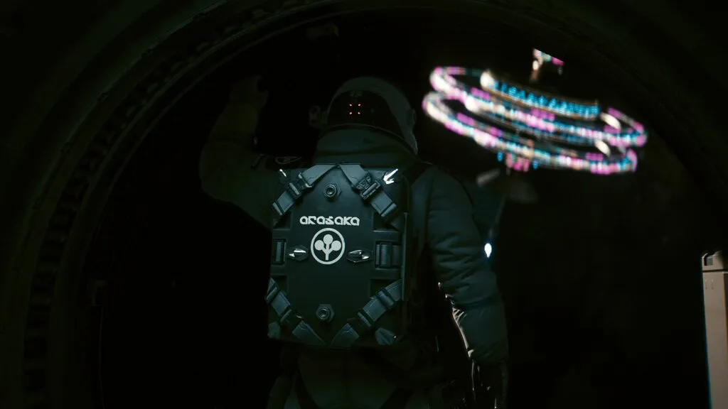 An astronaut in an Arasaka airlock facing the light
